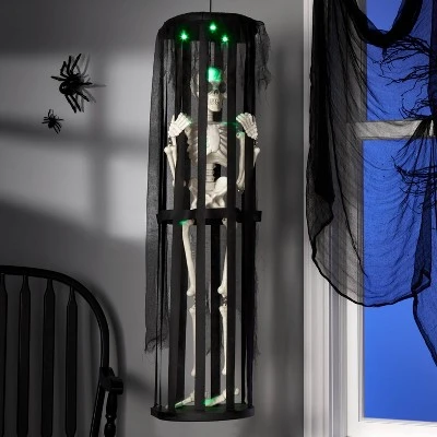 Hyde & EEK! Boutique Animated Skeleton in a Cage Halloween Decorative Prop - Hyde & EEK! Boutique™ 1 Hyde & EEK! Boutique Animated Skeleton in a Cage Halloween Decorative Prop - Hyde & EEK! Boutique™