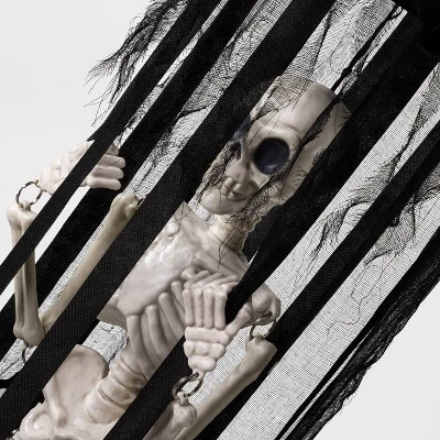 Hyde & EEK! Boutique Animated Skeleton in a Cage Halloween Decorative Prop - Hyde & EEK! Boutique™ 2 Hyde & EEK! Boutique Animated Skeleton in a Cage Halloween Decorative Prop - Hyde & EEK! Boutique™ - Image 2