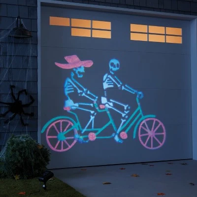 Hyde & EEK! Boutique LED Fluttering Fright Skeleton Halloween Lightshow Projection - Hyde & EEK! Boutique™ 1 Hyde & EEK! Boutique LED Fluttering Fright Skeleton Halloween Lightshow Projection - Hyde & EEK! Boutique™